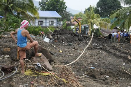 At least 126 dead and missing in massive flooding and landslides in the Philippines